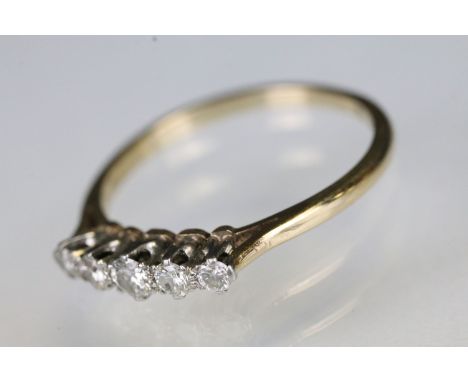 9ct gold and diamond five stone ring. The ring being set with five graduating diamonds in prong settings. Marked 9ct to shank