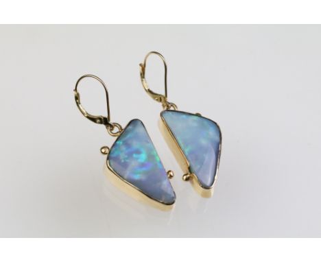 14ct gold and opal pendant earrings. The earrings set with triangular opal panels in bezel settings with ball detailing. Mark