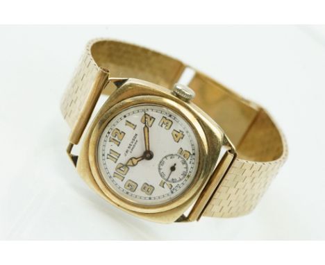 9ct gold J W Benson gold cased wrist watch having a round face with Arabic numerals to the chapter ring and subsidiary dial t