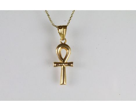 Egyptian 18ct gold ankh pendant on a fine yellow metal chain with spring ring clasp. Egyptian gold mark to bale. Pendant meas