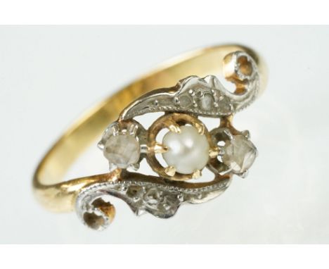 Antique 19th Century French 18ct gold pearl and diamond crossover ring. The ring set with a pearl to centre surrounded by ros