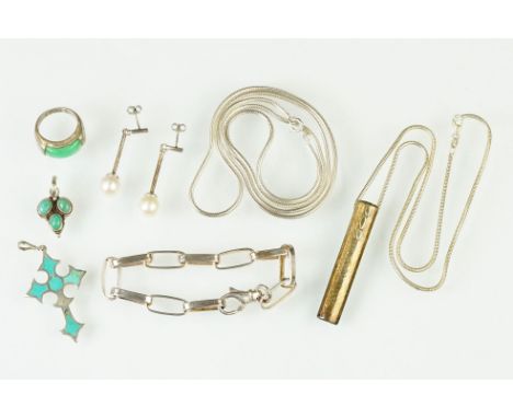 Collection of silver jewellery to include a silver and jadeite set ring, two turquoise set pendants, snake chain, oval ink br