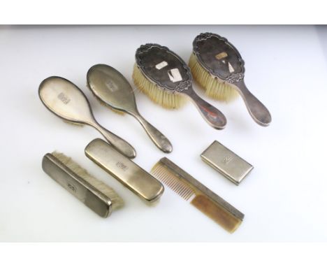Early 20th Century Mappin &amp; Webb silver backed dressing table set having an engine turned back with raised initial panels