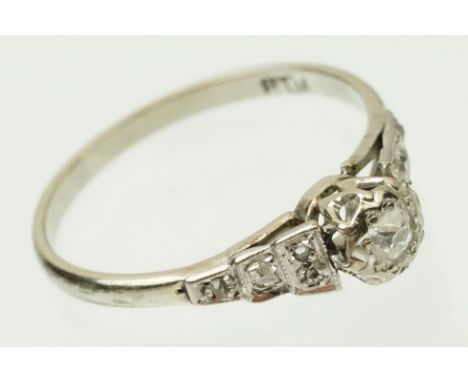 Vintage 18ct white gold and diamond ring. The ring being set with an old cut diamond to the head with accent stones to the sh