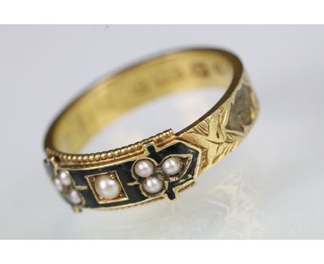 19th Century Victorian mourning ring being set with seed pearls to the black enamelled head with hair work panels to the band