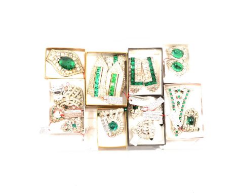 Nineteen Art Deco and later faux emerald and diamond costume jewellery dress clips, a pair of 30mm dress clips with oval faux