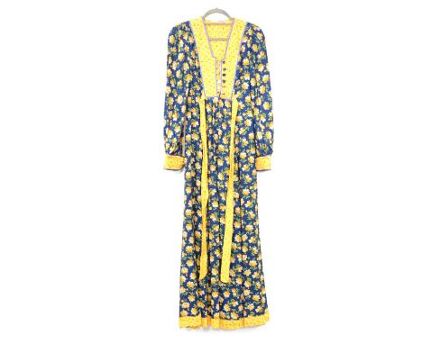 Fine Feathers of Henley in Arden - a vintage maxi dress, blue ground decorated in mustard yellow, green and grey blooms, must