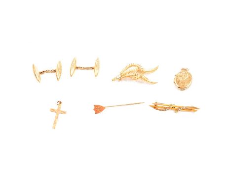 A collection of gold and yellow metal jewellery, a pair of 9 carat yellow gold torpedo shaped cufflinks with scroll engraved 