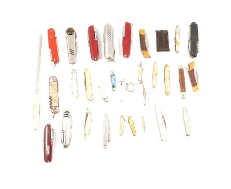A collection of penknives and fruit knives, eight multi-tools; faux mother-of-pearl penknives; a Penguin Stockings penknife; 