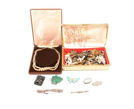 A collection of silver, white metal and costume jewellery, a malachite leaf brooch, in unmarked white metal; a floral brooch,