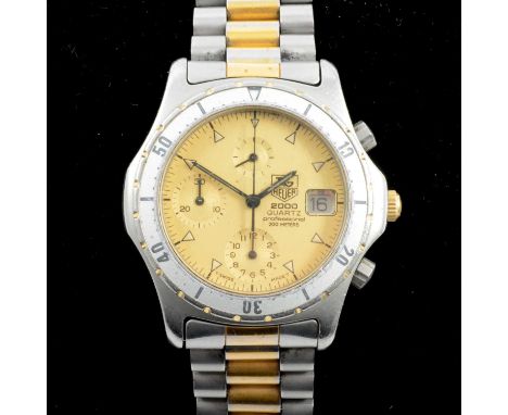 TAG Heuer - a gentleman's 2000 Quartz wristwatch, 27mm circular gold coloured dial with triangular baton markers markers, cen