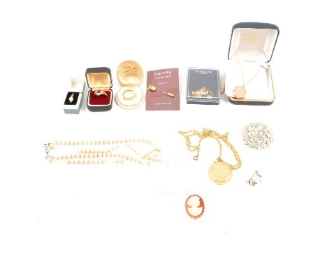 A collection of gold and costume jewellery,a 9ct back and front locket with metal core on a 1.1mm gauge yellow metal mesh des