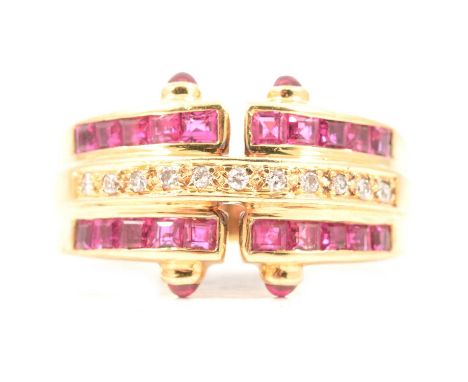 A ruby and diamond ring, three bands with a central row of eleven brilliant cut diamonds bordered by ten square cut rubies ch