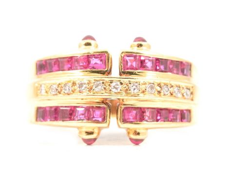 A ruby and diamond ring, three bands with a central row of eleven brilliant cut diamonds bordered by ten square cut rubies ch