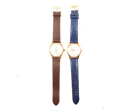Garrard - two 9 carat yellow gold gentlemen's wristwatches, a gentleman's automatic wristwatch, 29mm silvered circular baton 