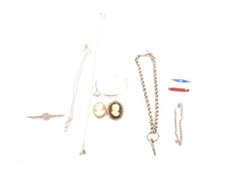 Brooches, bracelets, bangles, pendant, and chain, a cherry amber-coloured brooch, yellow metal mounts; a silver curb link bra