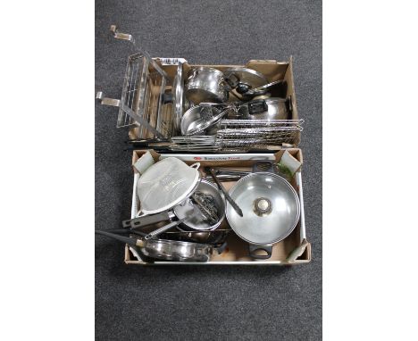 Two boxes containing kitchenalia to include pans, utensils, kitchen spice rack