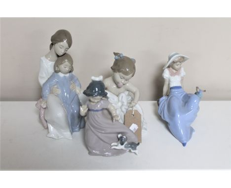 Four Nao figures - mother with child, baby, girl with puppy and girl on rock 