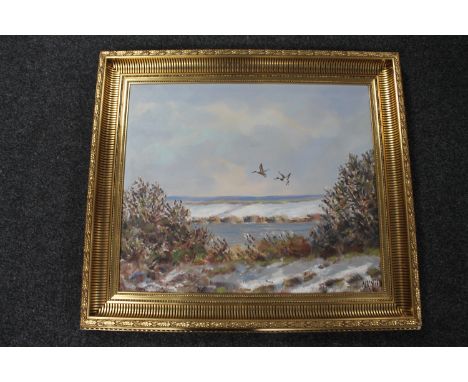 A 20th century gilt framed oil on canvas, signed N K Niels - ducks in flight, 64cm by 54cm