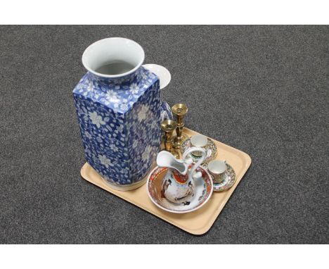 A tray containing a pair of 20th century Japanese coffee cans and saucers together with a contemporary Japanese water jug and