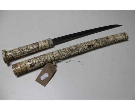 A Japanese tanto knife with carved bone handle and sheath 