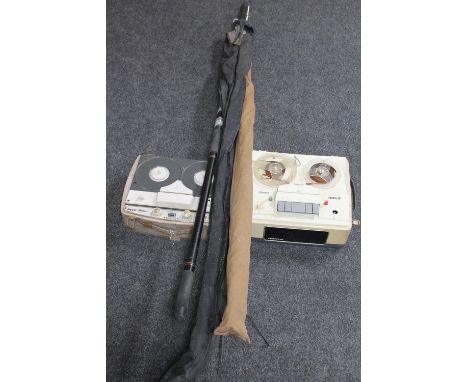 Two mid 20th century reel to reel players, two boat rods and a pick axe walking stick 