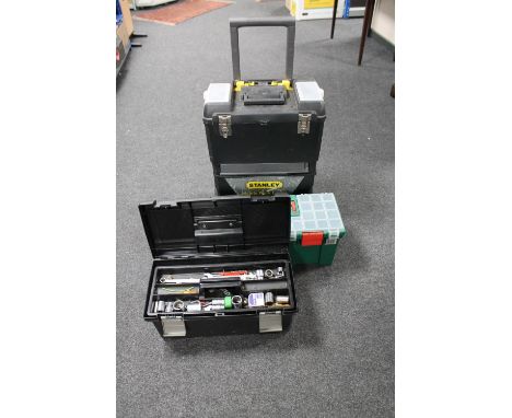 A Stanley mobile work centre together with two further plastic tool boxes containing hand tools 