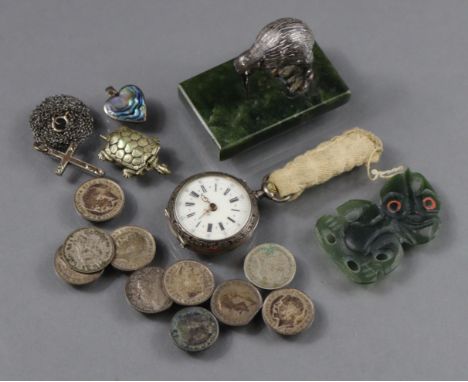 A Swiss fob watch in engraved silver case; a silver crucifix pendant on chain necklet; nine George V silver 3d; a Maori green