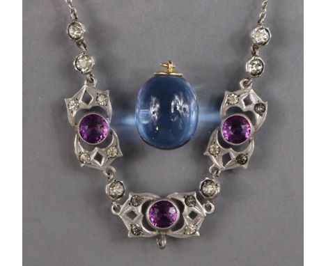 A Baccarat Psydelic crystal ovoid pendant, the yellow metal mount signed Baccarat &amp; marked ‘750’, 2cm high; &amp; a paste