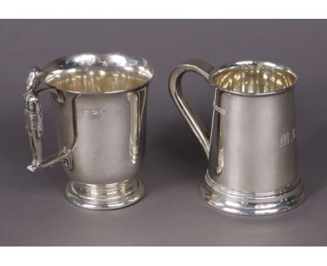 A small plain mug with cast handle in the form of a Grenadier Guardsman, 10cm high, Sheffield 1942, by Mappin &amp; Webb (5½ 