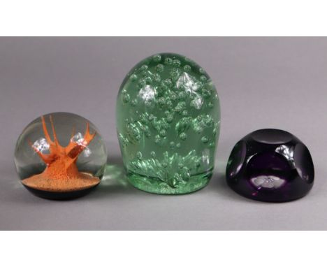 A Victorian green glass dump paperweight with bubble inclusions, 8.5cm diam. x 11cm high; a Caithness coral paperweight by Co