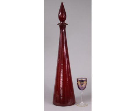A 20th century Venetian glass goblet with gilt decoration to the amethyst-coloured bowl, on clear stem &amp; foot, 16.5 cm.; 
