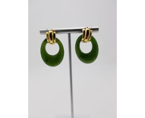 Pair of 14K Gold & Jade Earrings. Stamped 14K on clasp. Total Weight: 13.3 g. Jade Sizes: 1.25 x 1 in. - All silver, gold and
