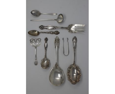 George W. Shiebler & Co. Sterling Spoon Weight: 1.17 ozt Length: 6 in. Frantz Hingelberg Sterling Olive Spoon Weight: 1.4 ozt