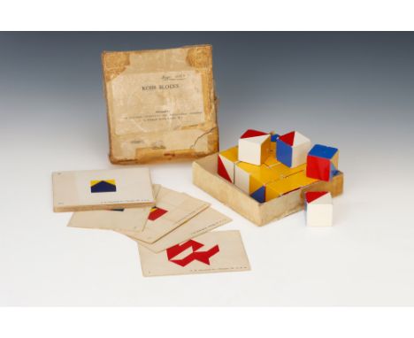 An Early Set of Kohs Blocks - Early IO Test, American, c.earky 20th Century, label to the front reads 'KOHS BLOCKS, Distribut