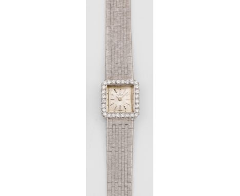 Damenarmbanduhr von IWC-Schaffhausen aus den 1960er JahrenWeißgold, gest. 750. Quadratisches Uhrengehäuse, Lünette mit Brilla