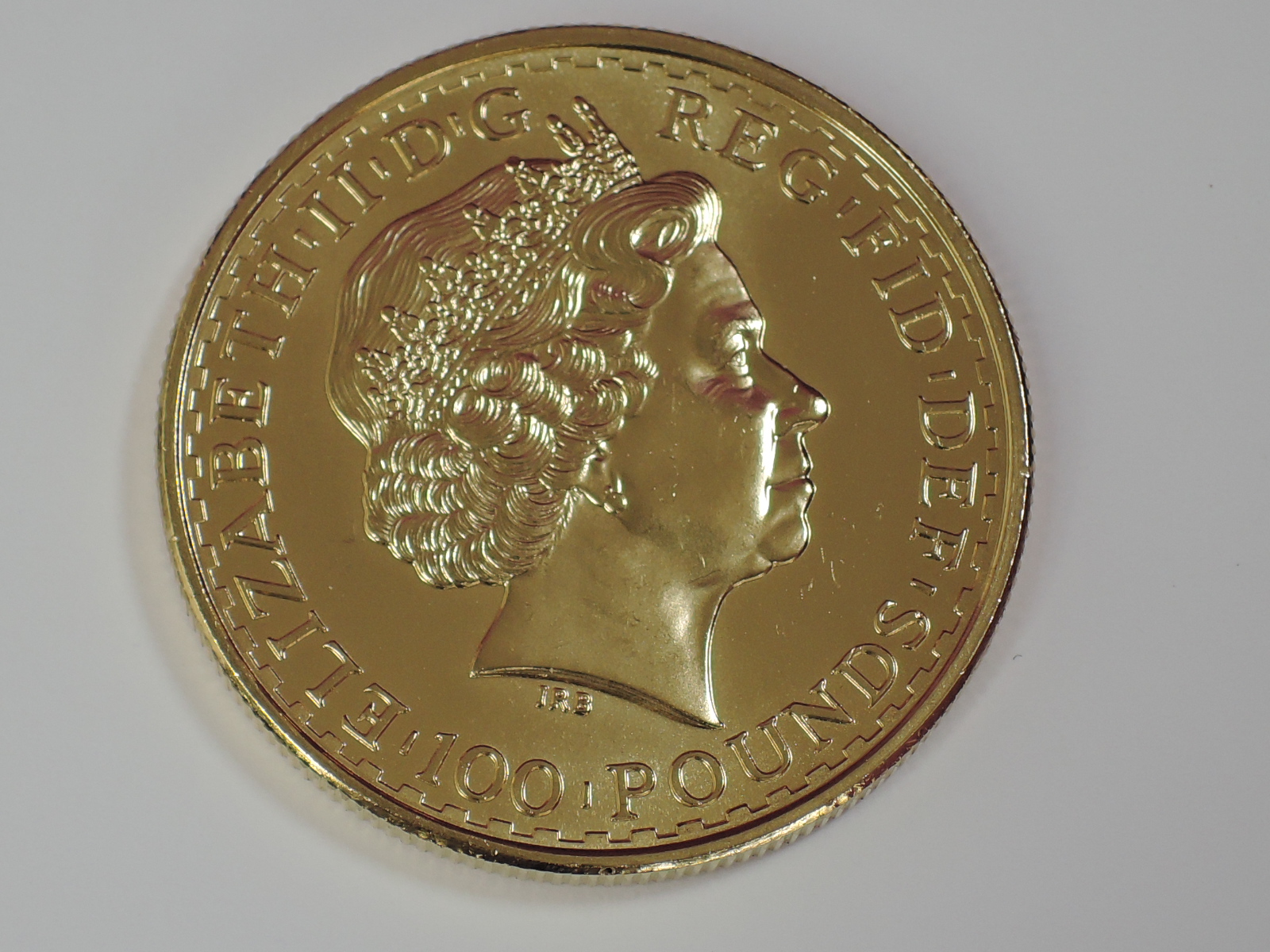 A gold 1oz 2010 Great Britain Britannia 100 pound coin, in plastic case