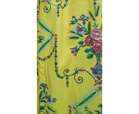 CURTAINS, a pair, in cotton floral design lined each 74cm W x 265cm drop plus pelmets and swags and tails from Hotel de Paris