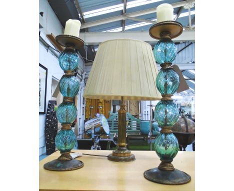 CANDLESTICK HOLDERS, a pair, blue glass, 80cm H overall, and a brass column lamp with shade, 75cm overall. (3) 