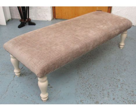 LONG FOOTSTOOL, in a light silver brown chenille upholstery with chrome studs on turned cream painted legs, 115cm L x 48cm W 