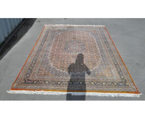 Late 20th century Persian Islamic carpet floor rug. Central medallion with blue panel, geometric shapes and star borders with
