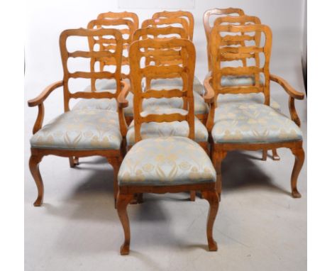 Set of ten 19th century French walnut dining chairs. Shaped ladder back rest with upholstered floral fabric padded seat set o