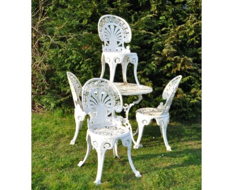 20th century cast iron Victorian style white painted garden dining suite comprised of a circular table and four chairs. Chair