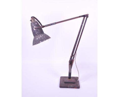 Herbert Terry - A mid century retro industrial factory black anglepoise table lamp light. Supported on a square stepped base,