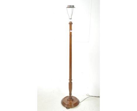 1920's mahogany standard lamp with reeded column and terraced base having shade atop