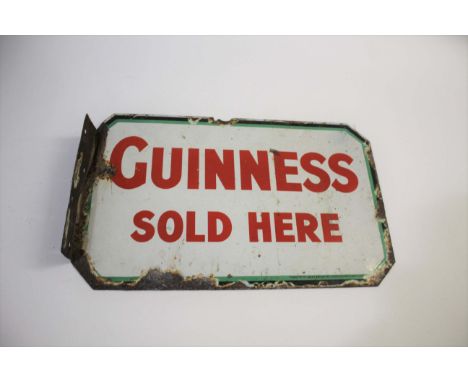 GUINNESS ADVERTISING ENAMEL SIGN a double sided flanged sign, with Guinness is good for you, and Guinness sold here. Made by 