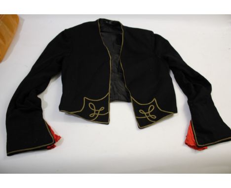 VINTAGE THEATRICAL COSTUME including a pair of black trousers (label for W Clarkson, London), a black embroidered jacket, a l