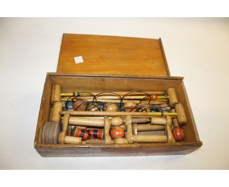VINTAGE TABLE CROQUET SET a boxed set, including small croquet mallets, balls, hoops etc. With instructions for play on a lab