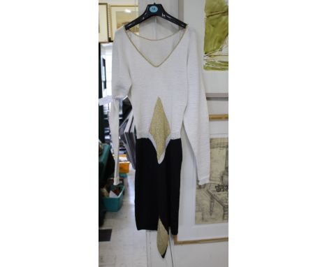 VINTAGE CLOTHING  including a 1970's knitted cream, black and gold dress, believed to have been made on the first knitting ma