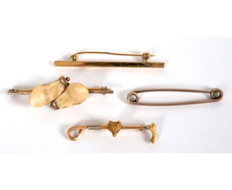 15CT GOLD HUNTING STOCK PIN in the form of a Fox mask and riding crop, stamped 15ct. Also with a brooch mounted with Deer tee